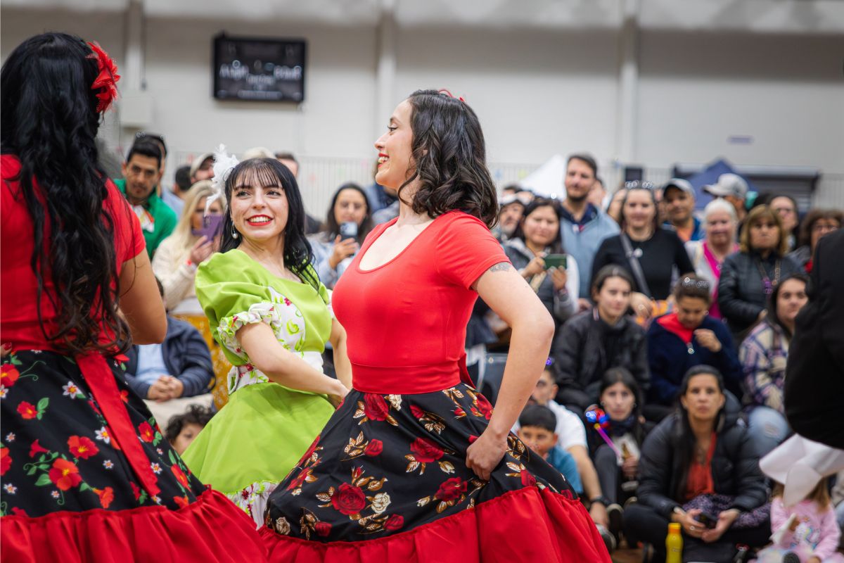Traditional Latin American dancers performing in front of the festival audience