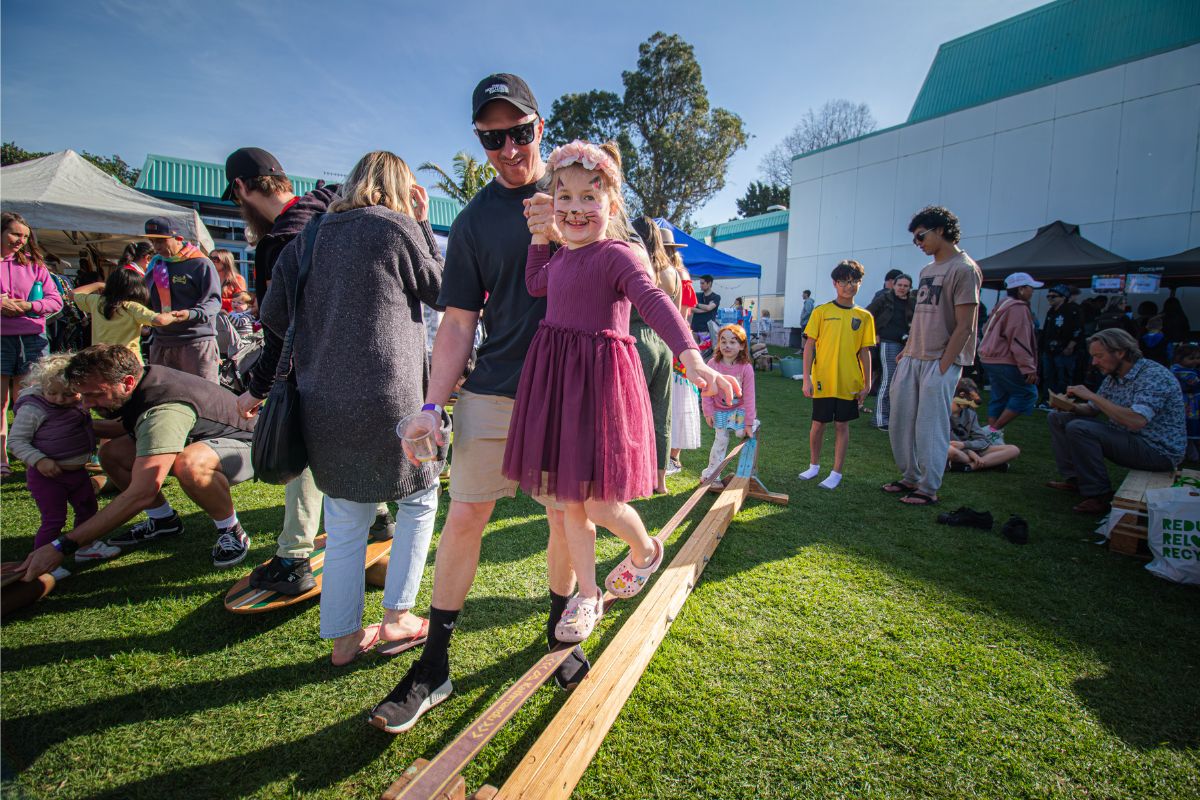 Families enjoying outdoor activities together at the Latin American Spring Festival