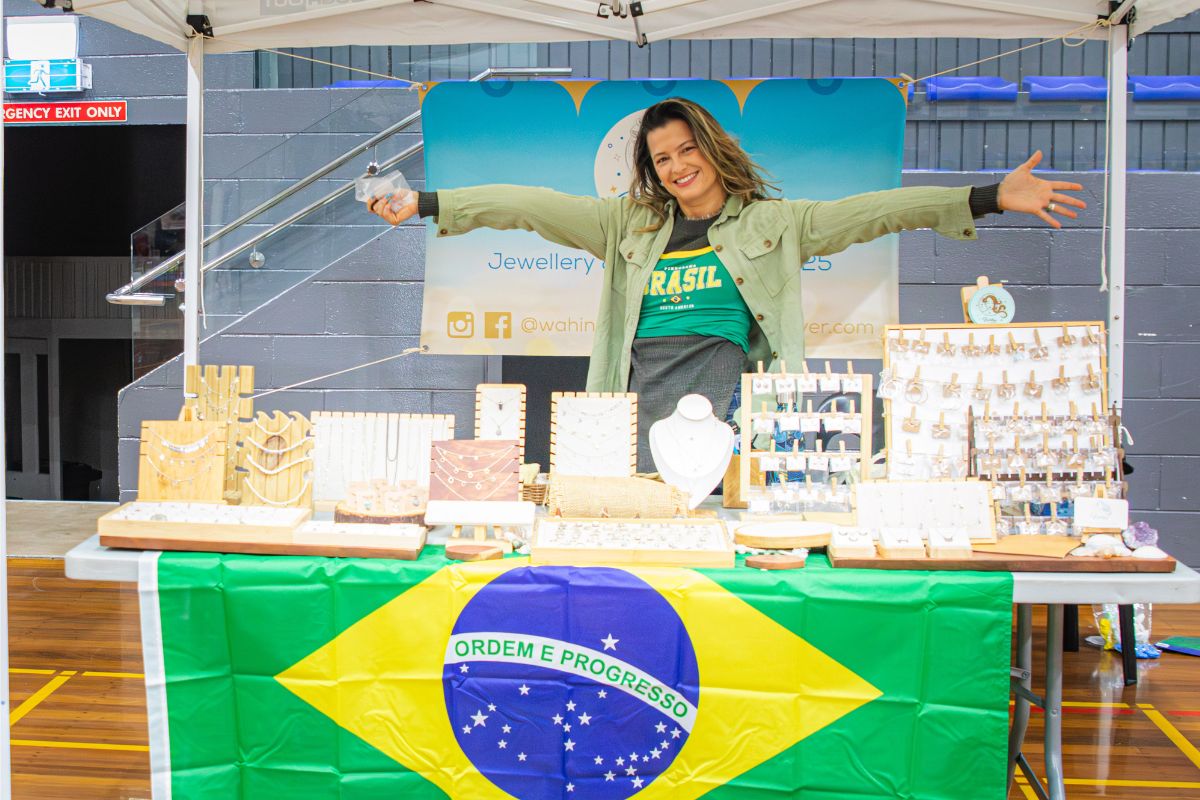 Local artisan showcasing handmade products at the festival market